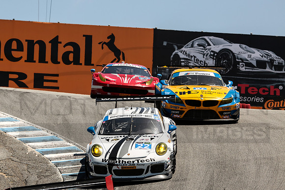 A Group of Cars in the "Corkscrew" at Mazda Raceway Laguna Seca